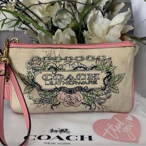 Limited Edition Coach Floral Pink and Cream Floral Wristlet With Bow Charm